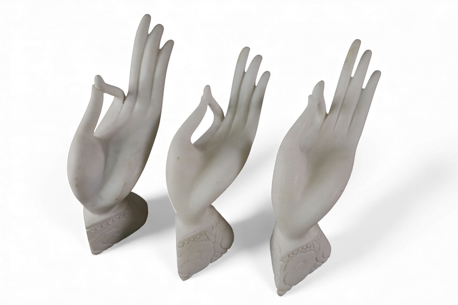 3 ALABASTER HANDS: TABLE TOP ALABASTER HAND SCULPTURES, 13" L .