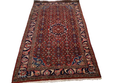 APPROX 6' 9" x 4' 2" HANDMADE WOOL RUG