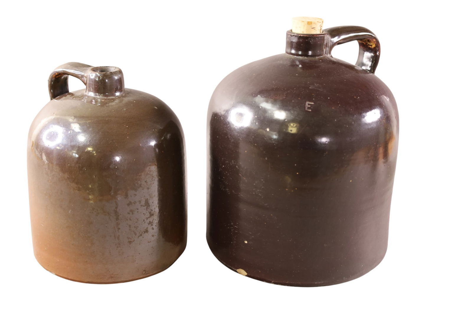 2 CROCKERY JUGS: 2 STONEWARE JUGS. 9" - 11" H.