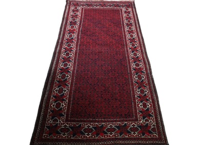 APPROX 6' 6" x 3' 4" HANDMADE WOOL RUG