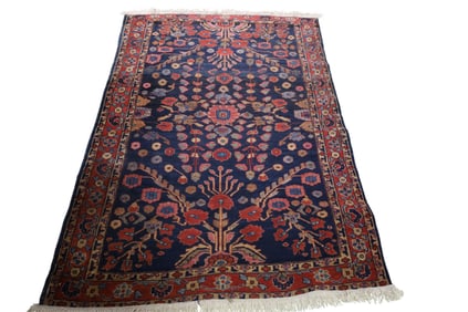 APPROX 3' 3" x 5' 2" HANDMADE WOOL RUG
