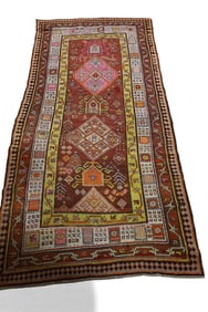 APPROX 3' 7" x 7' 9" HANDMADE WOOL RUG