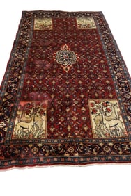 APPROX 4' 10" x 9' 7" HANDMADE WOOL RUG