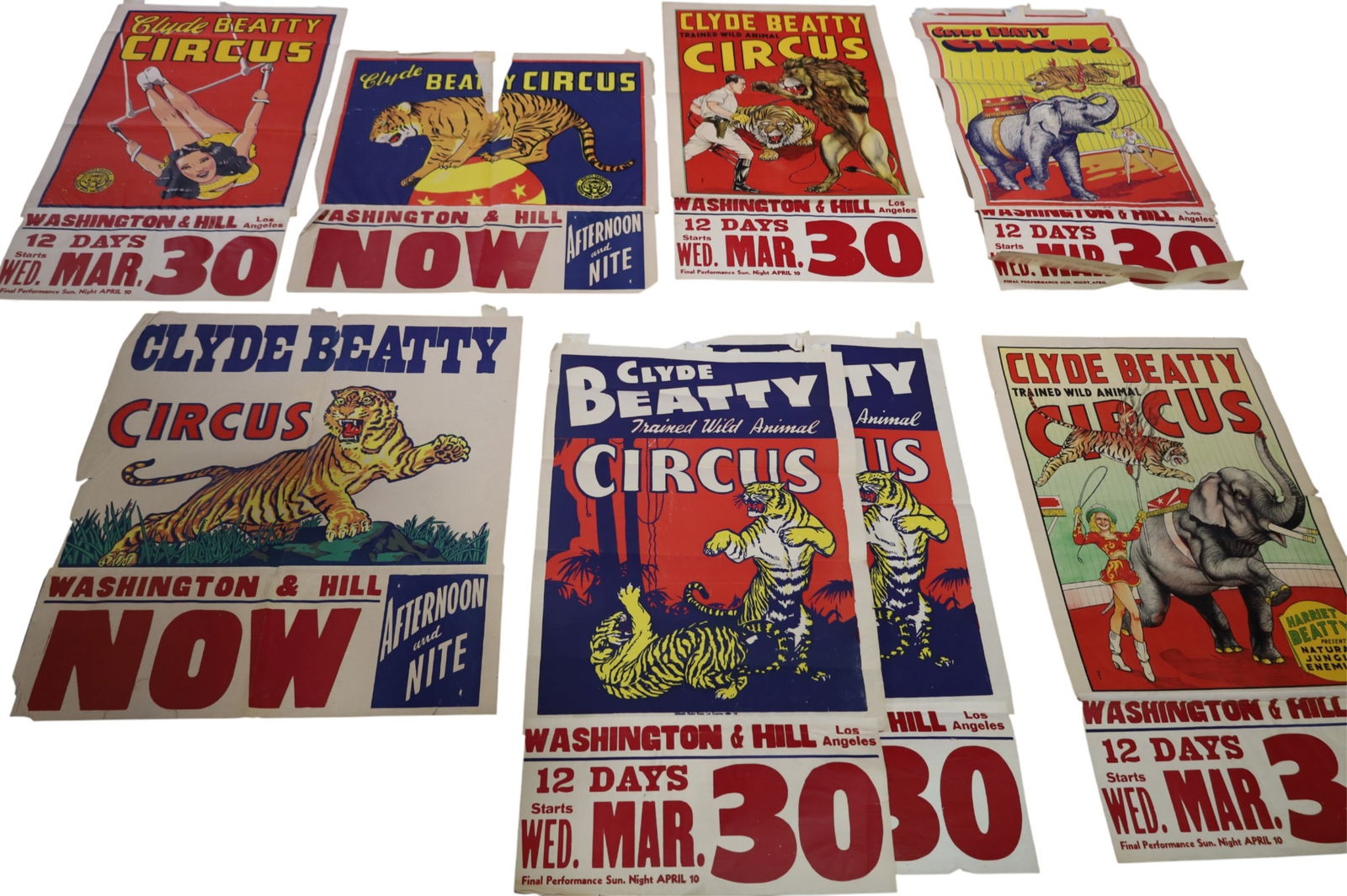 CLYDE BEATTY CIRCUS POSTERS: COLLECTION OF 9 CLYDE BEATTY CIRCUS POSTERS. CREASES AND TEARS.