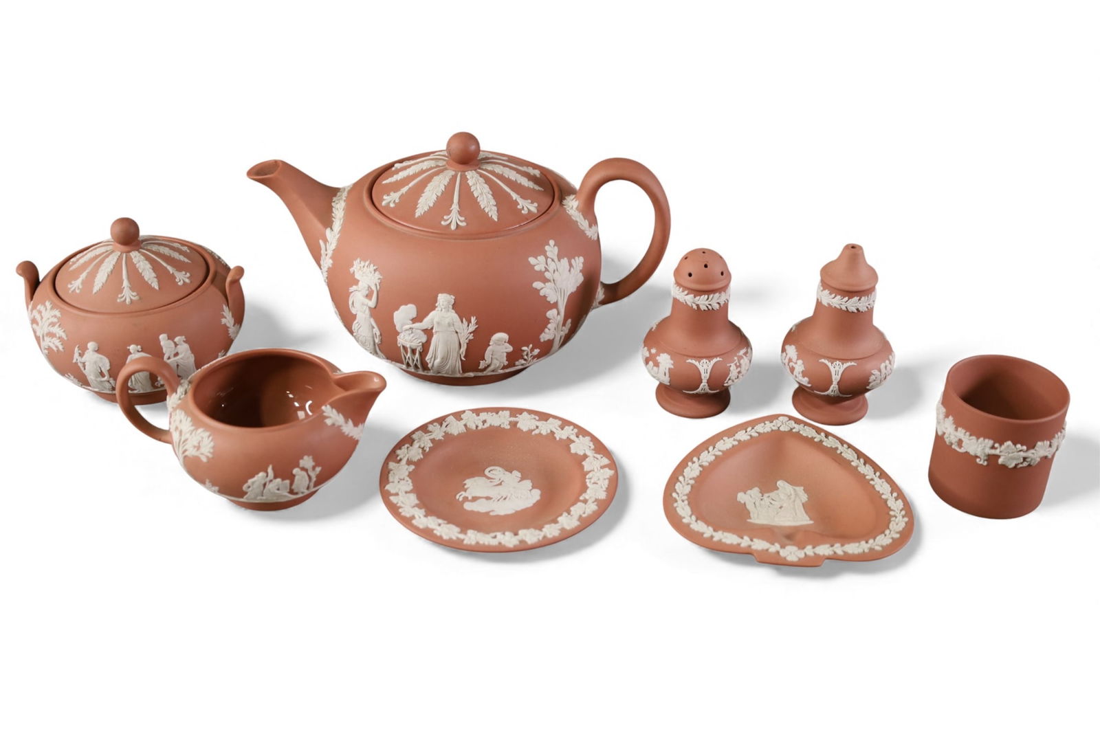 COLLECTION OF WEDGWOOD TERRA COTTA: INCLUDING TEA POT, CREAMER AND SUGAR, SALT AND PEPPER AND MORE.