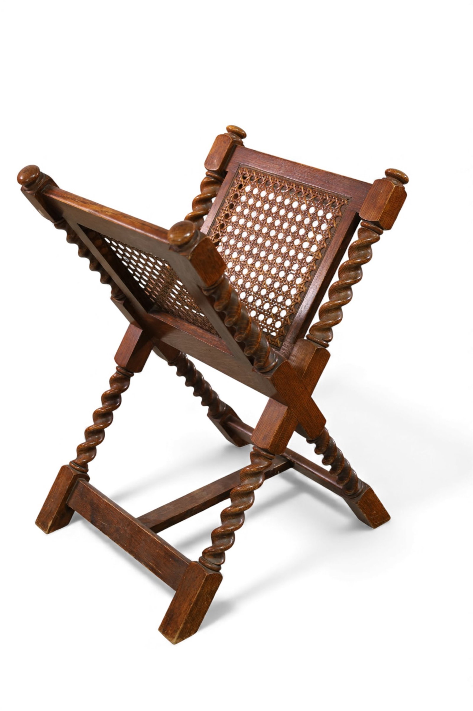 BARLEY TWIST MAGAZINE STAND: OAK CANE SIDE BARLEY TWIST MAGAZINE STAND, 16" W x 18" D x 26" H. THIS ITEM EXCEEDS SIZE LIMITATIONS FOR IN HOUSE SHIPPING, IT MUST BE PICKED UP IN HOUSE OR SHIPPED VIA 3rd PARTY GROUND SHIPPER.