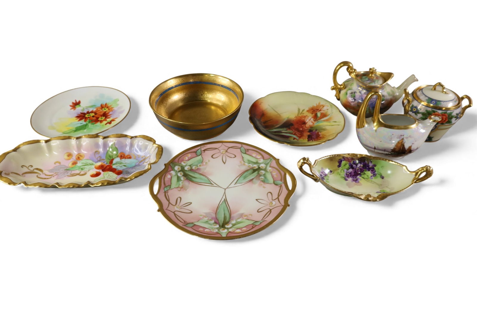 9 PIECES OF BRAUER PORCELAIN: HAND PAINTED TEA POT, CREAMER AND SUGAR, AND TRAYS.