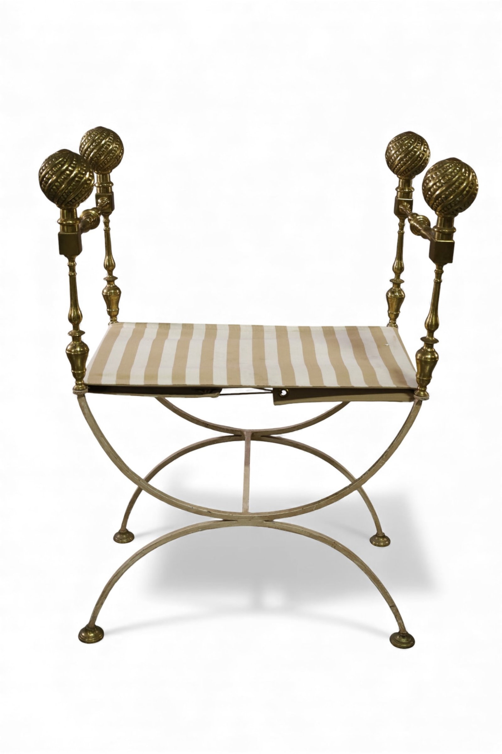 IRON AND BRASS CURULE CHAIR: IRON AND BRASS CURULE CHAIR, 27" W x 18" D x 38" H. THIS ITEM EXCEEDS SIZE LIMITATIONS FOR IN HOUSE SHIPPING, IT MUST BE PICKED UP IN HOUSE OR SHIPPED VIA 3rd PARTY GROUND SHIPPER.