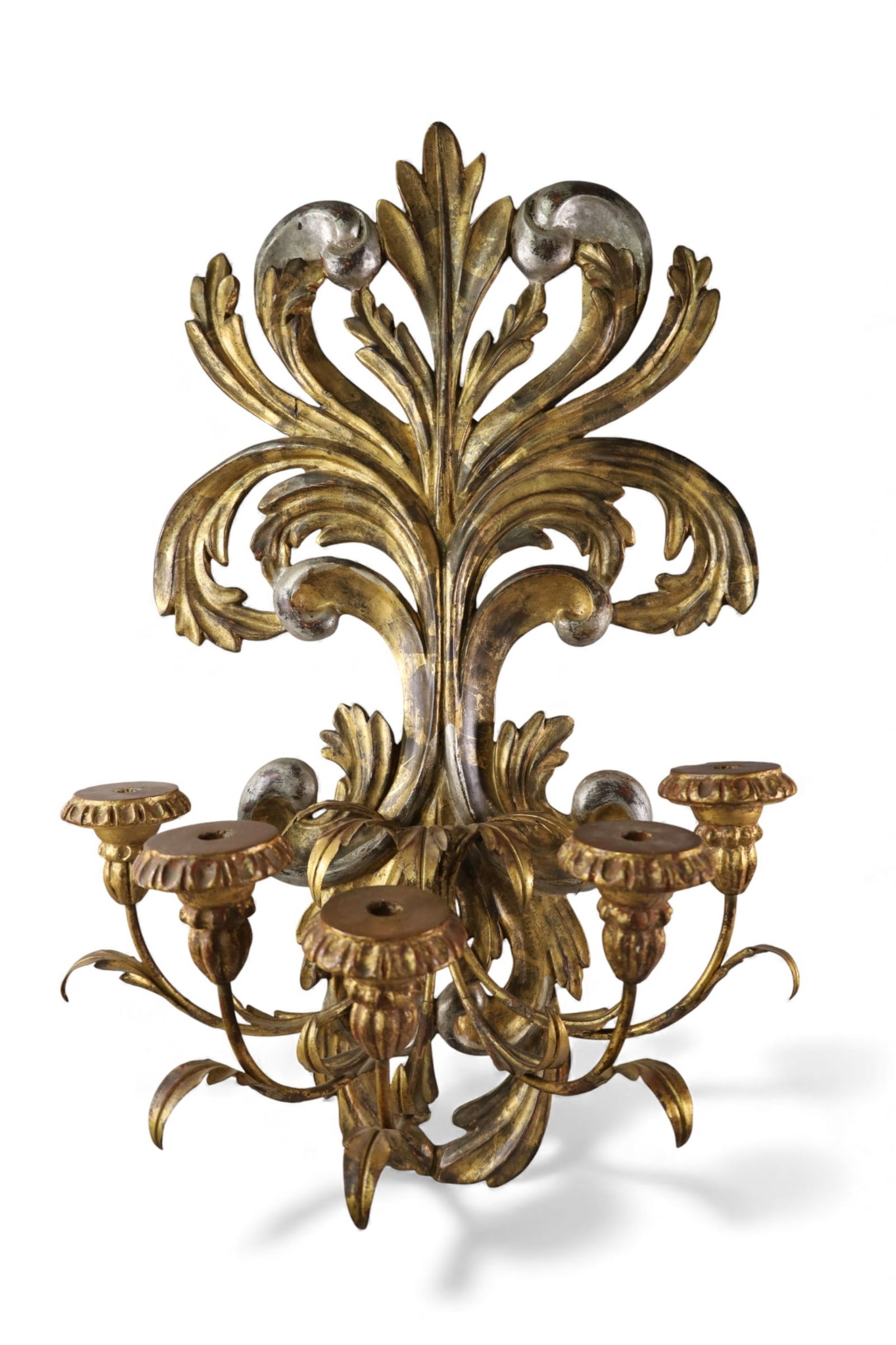 ORNATE ITALIAN WALL CANDELABRA: LARGE CARVED WOOD AND METAL CANDELABRA, 5 ARM. SOME PAINT LOSS. REPAIRS. 20" W x 32" H. THIS ITEM EXCEEDS SIZE LIMITATIONS FOR IN HOUSE SHIPPING, IT MUST BE PICKED UP IN HOUSE OR SHIPPED VIA 3rd PARTY