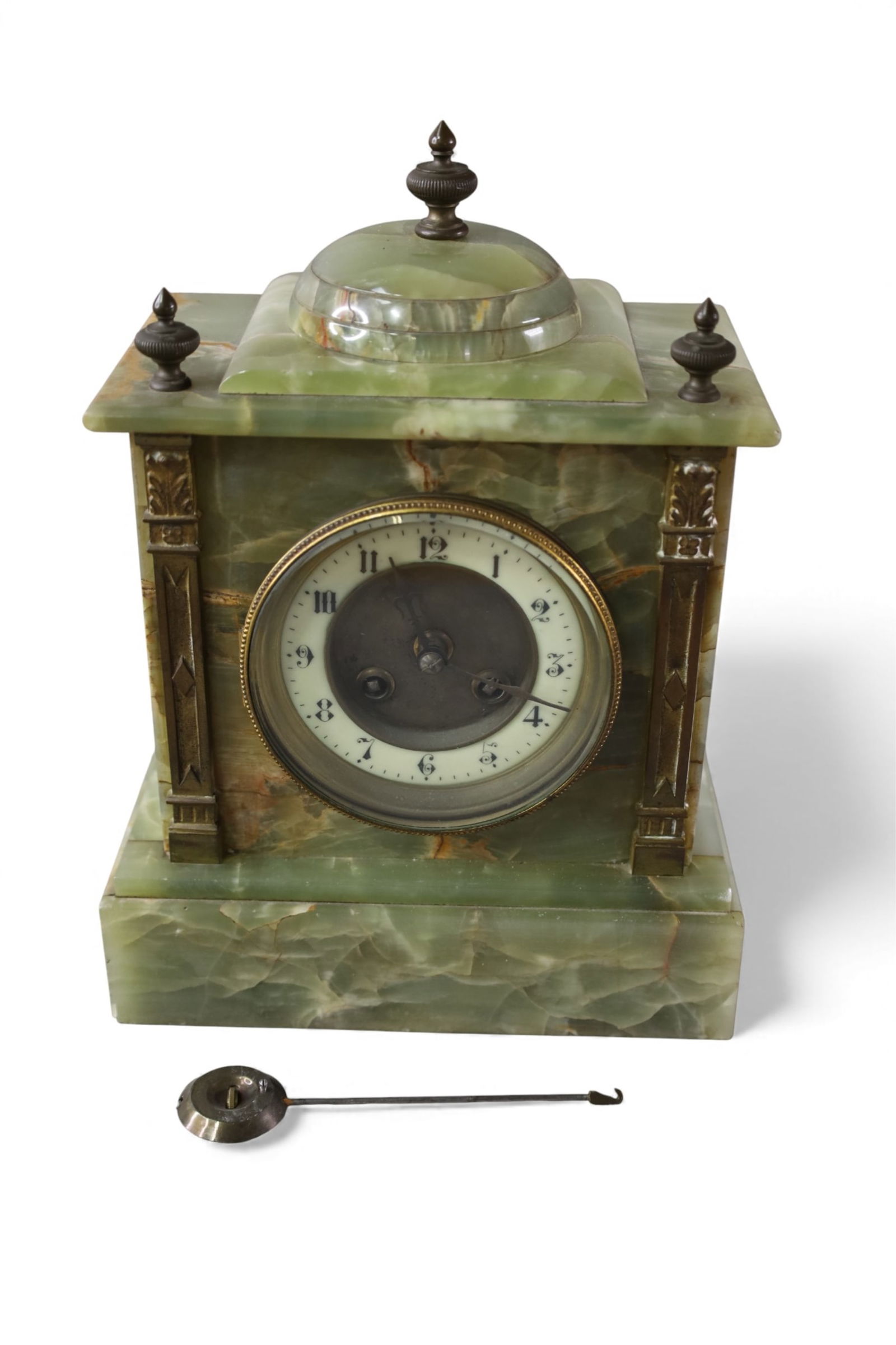 ONYX MANTLE CLOCK: MARKED JAPY ON WORKS, WITH PENDULUM. ALL CLOCKS ARE SOLD AS IS WE DO NOT GUARANTEE WORKING ORDER, 8 1/2" W x 11" H.