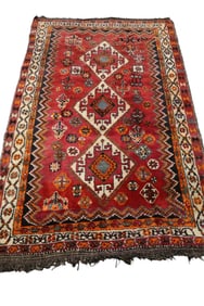 APPROX 4' 11" x 7' 8" HANDMADE WOOL RUG