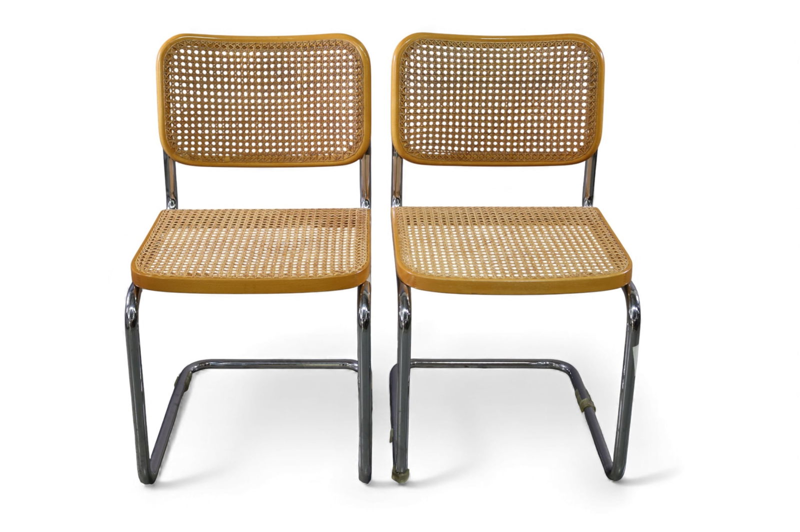 PAIR OF GAVINA CHAIRS: PAIR OF GAVINA CANE SEAT AND BACK CHROME PLATED SIDE CHAIRS. REPAIRS TO SEATS. 18" W x 22" D x 32" H. THIS ITEM EXCEEDS SIZE LIMITATIONS FOR IN HOUSE SHIPPING, IT MUST BE PICKED UP IN HOUSE OR SHIPPED