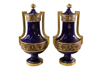 PAIR OF FRENCH PINON HEUZE URNS