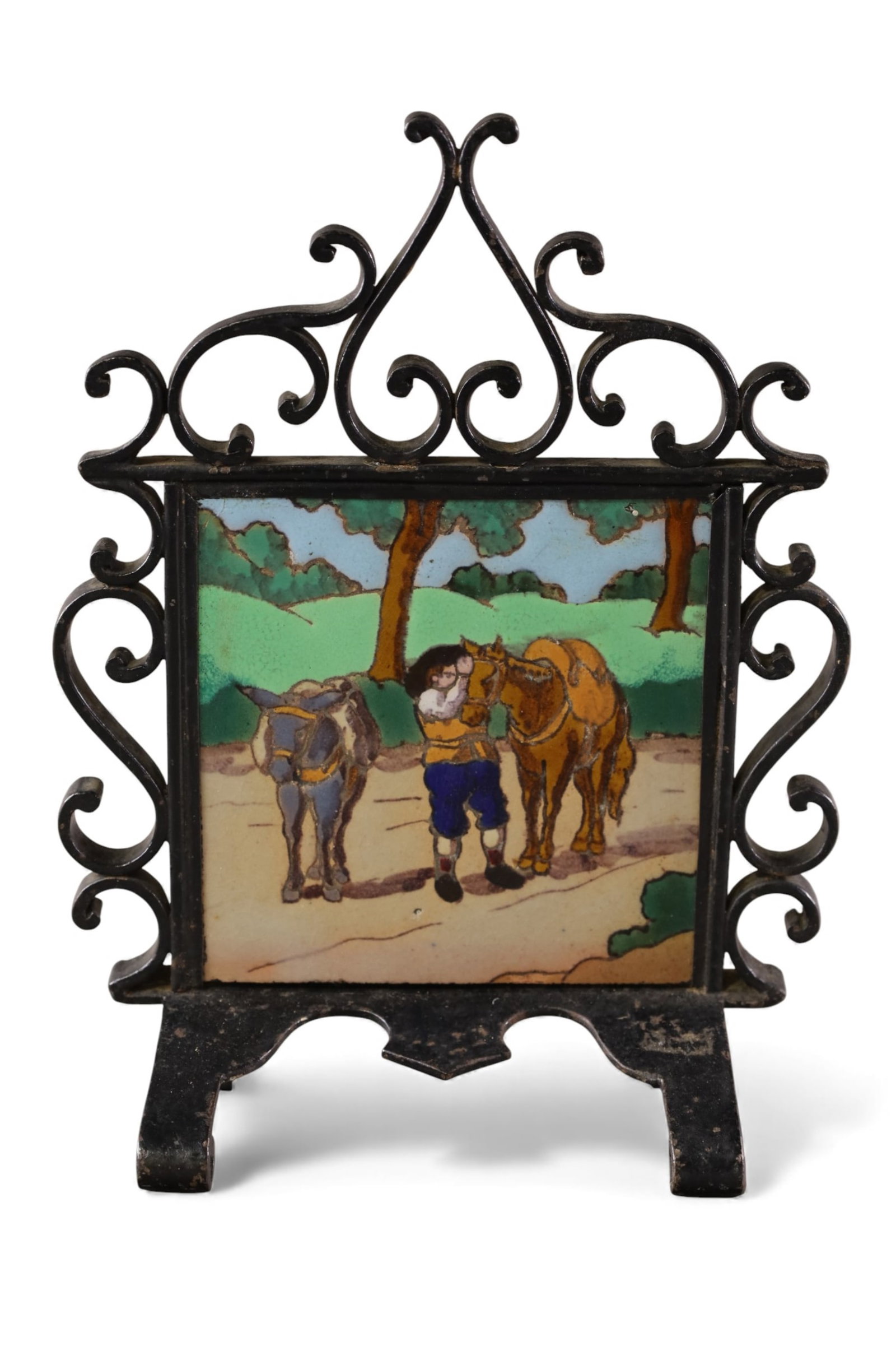RAMOS REJANO TILE: IN IRON STAND FRAME, 6" x 6" TILE, RAMOS REJANO MAN WITH HORSE AND MULE TILE. 8" x 10 1/2" IN STAND.