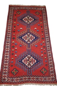 APPROX 6' 6" x 3' 8" HANDMADE WOOL RUG