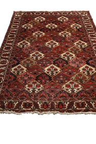 APPROX 6' 8" x 9' 4" HANDMADE WOOL RUG