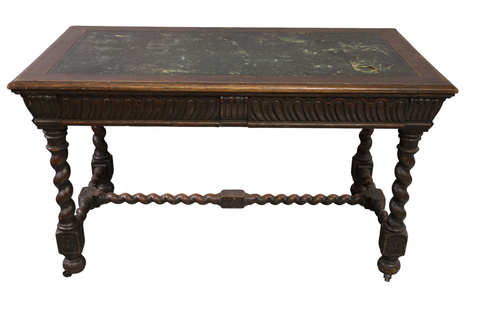 OAK BARLEY TWIST DESK: OAK BARLEY TWIST, LEATHER TOP DESK, WITH BARLEY TWIST STRETCHER, TEARS TO LEATHER. WEAR TO FINISH. 54" L x 30" W x 31" H. THIS ITEM EXCEEDS SIZE LIMITATIONS FOR IN HOUSE SHIPPING, IT MUST BE PICKED UP