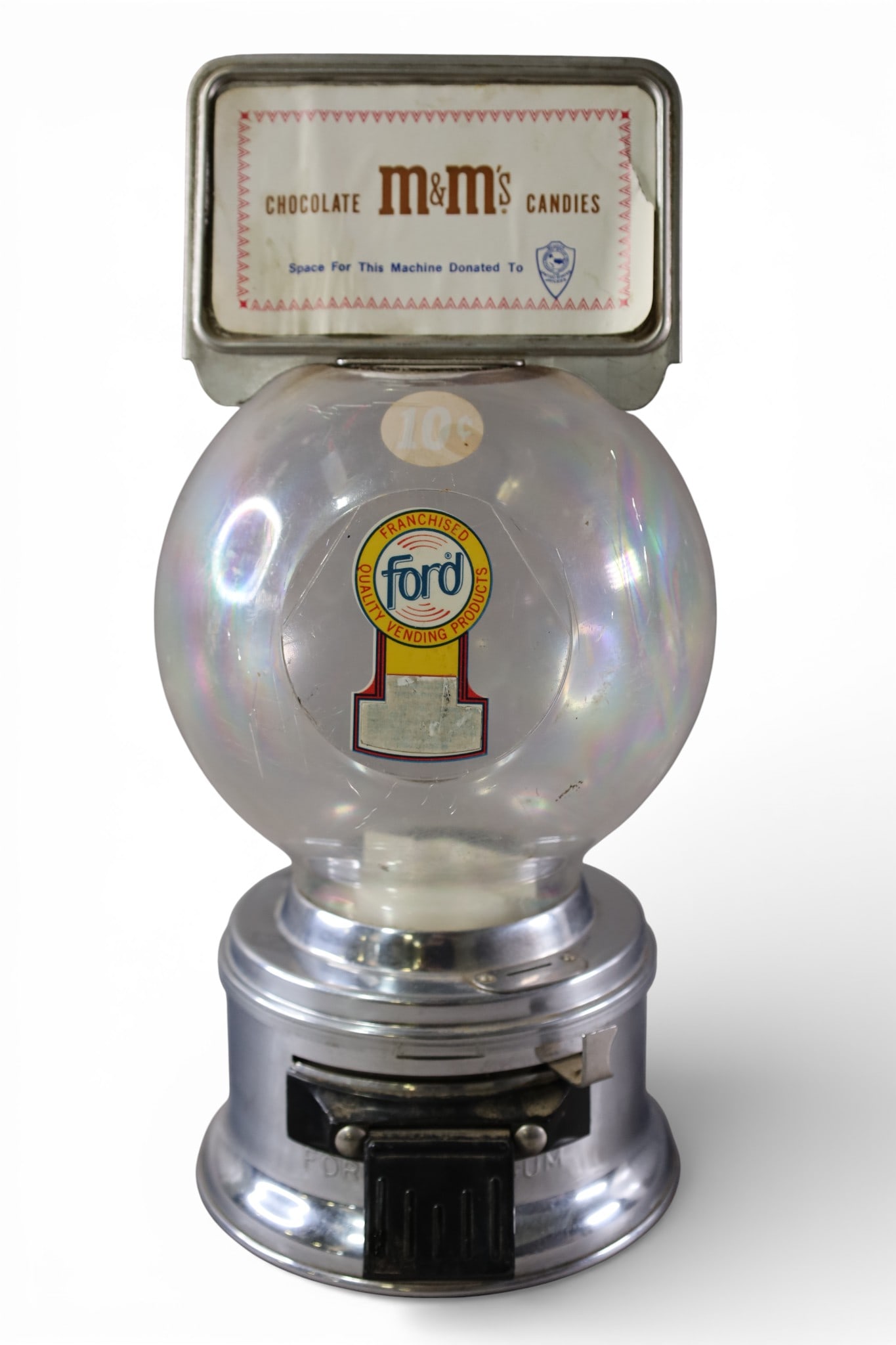 FORD GUMBALL: 10c FORD GUMBALL MACHINE, M&M TOPPER. CRACKS TO PLASTIC. 16" H.