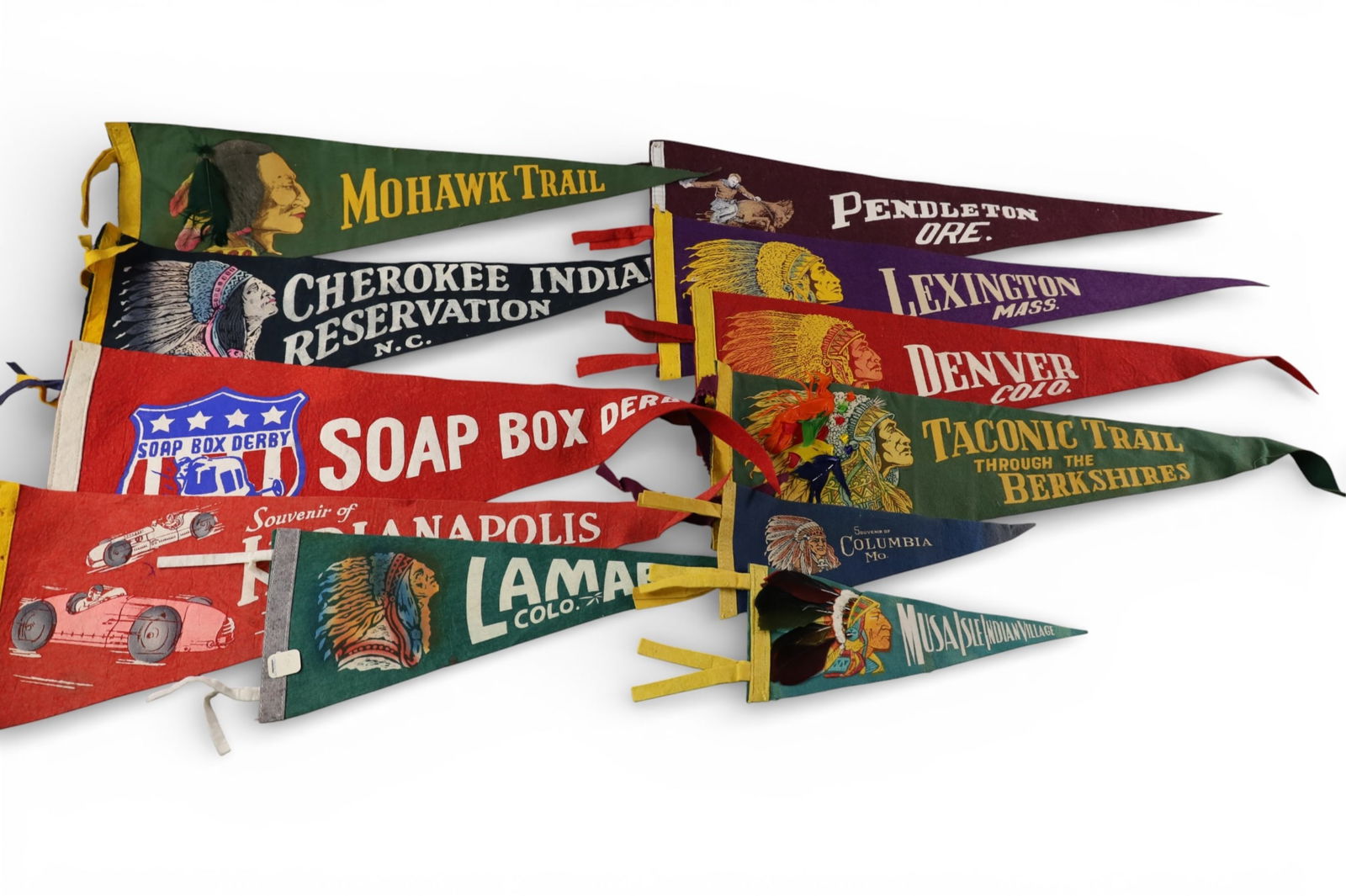 COLLECTION OF PENNANTS: 11 VINTAGE PENNANTS. MOSTLY NATIVE AMERICAN THEMED.