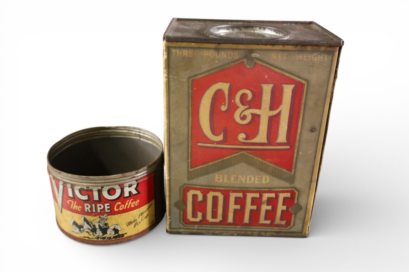 2 COFFEE TINS: VICTOR & C AND H COFFEE TINS.