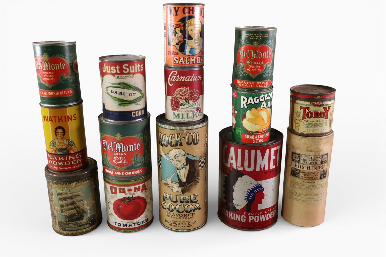 VINTAGE FOOD TINS: INCLUDING NUTS, CHERRIES, COCOA AND MORE.