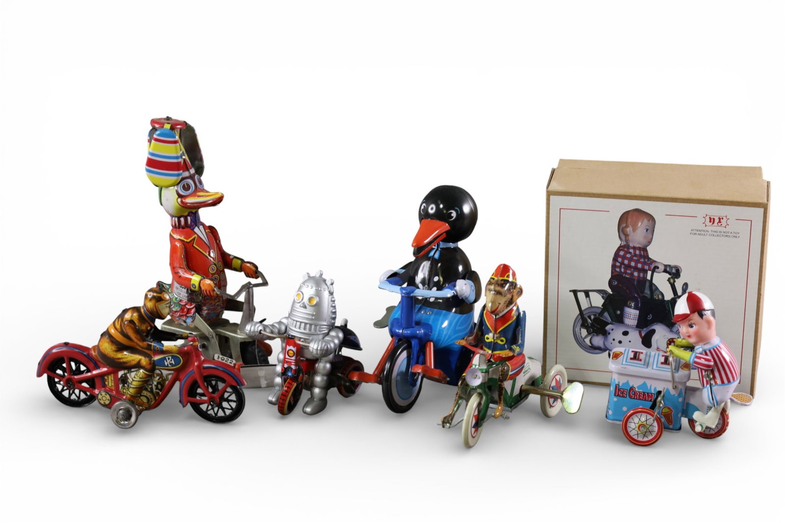 7 JAPANESE TOYS: 7 JAPANESE FRICTIONA ND KEY WIND TOYS. 4" - 8" H.