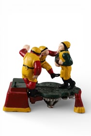 CAST IRON FOOTBALL BANK