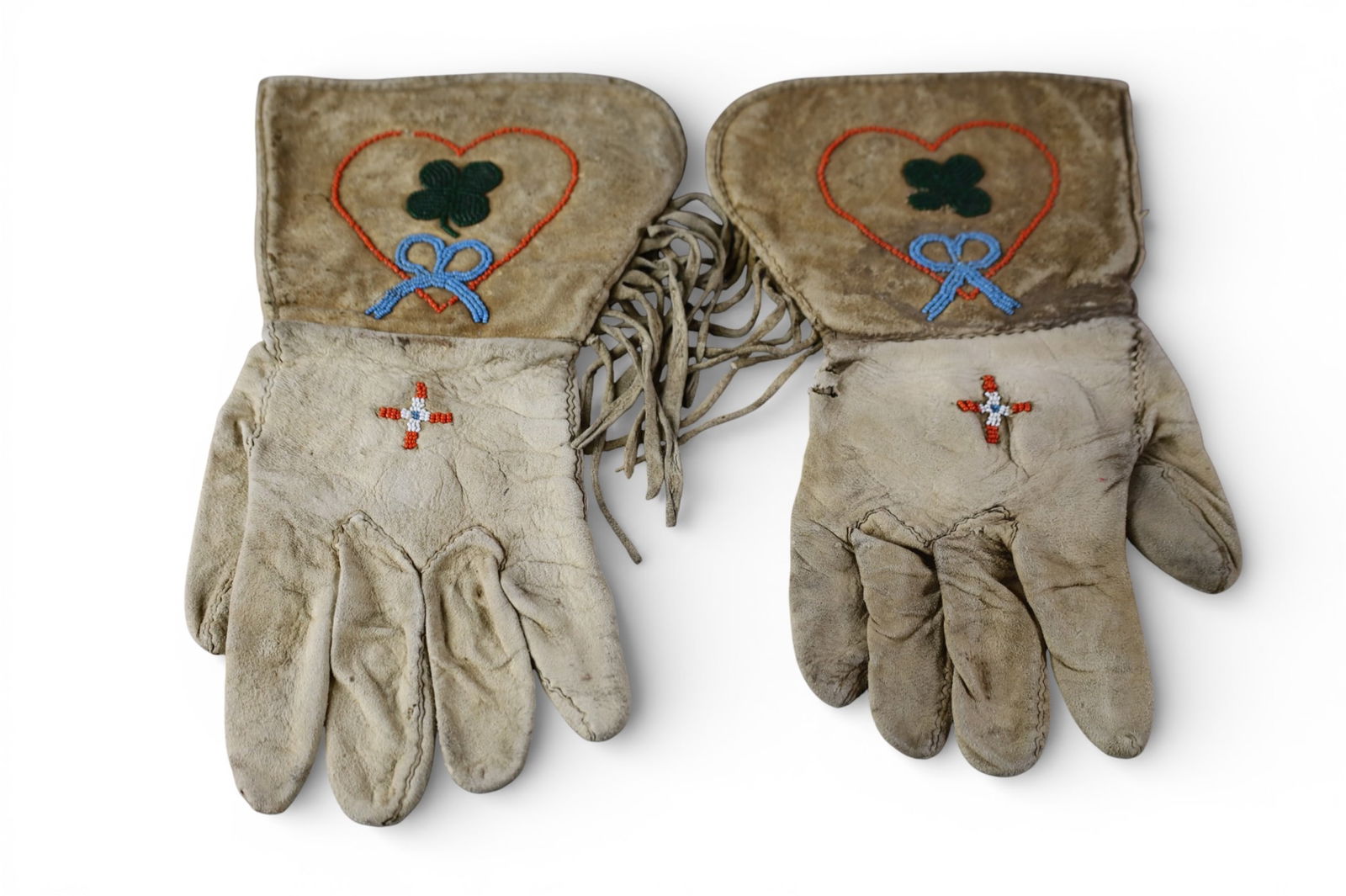 PAIR OF BEADED GAUNTLETS: PAIR OF HANDMADE NATIVE AMERICAN BEADED GAUNTLETS. 12" L.