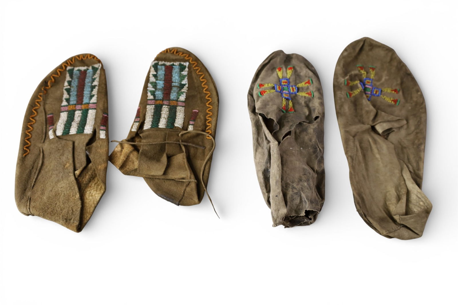 2 PAIRS OF BEADED MOCCASINS: PAIR OF HANDMADE NATIVE AMERICAN BEADED MOCCASINS. 8" - 11" L.