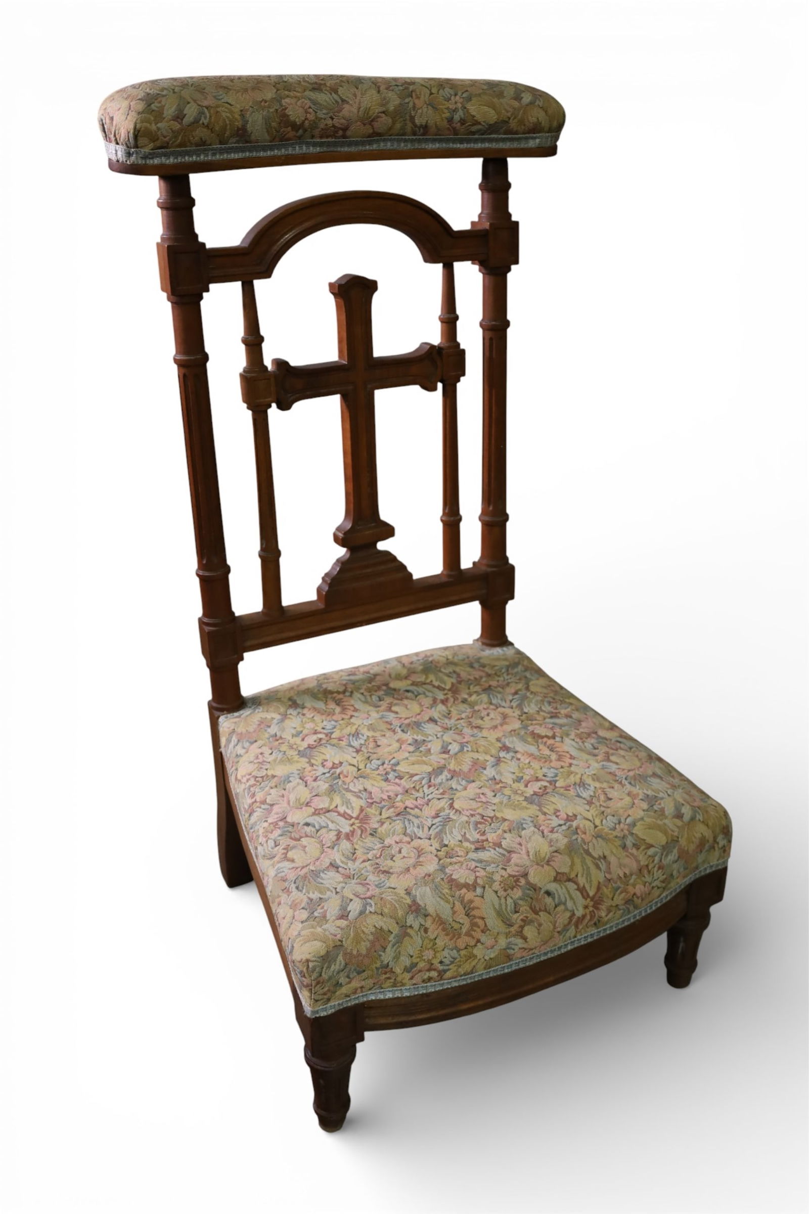 GOTHIC PRAYER CHAIR: UPHOLSTERED GOTHIC PRAYER CHAIR, CROSS DESIGNED CHAIR BACK. 18" W x 16" D x 36" H. THIS ITEM EXCEEDS SIZE LIMITATIONS FOR IN HOUSE SHIPPING, IT MUST BE PICKED UP IN HOUSE OR SHIPPED VIA 3rd PARTY GROU