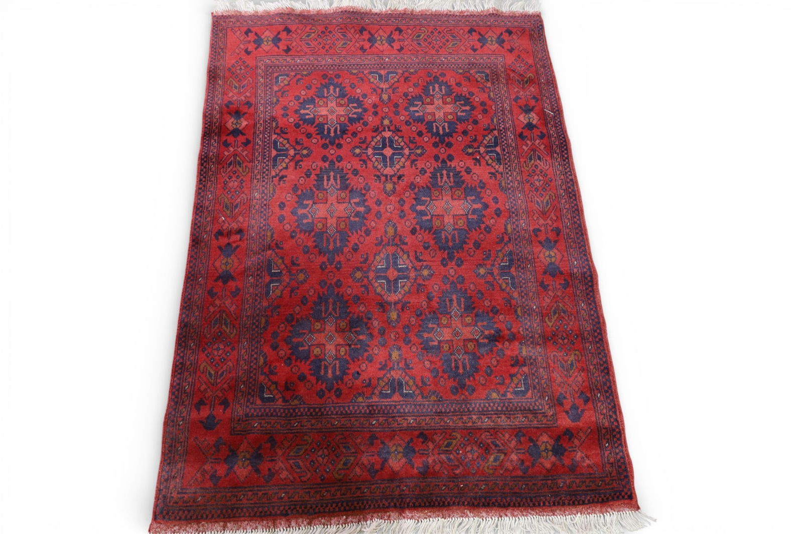 APPROX 4' 8" x 3' 4" HANDMADE WOOL RUG: HANDMADE WOOL RUG.