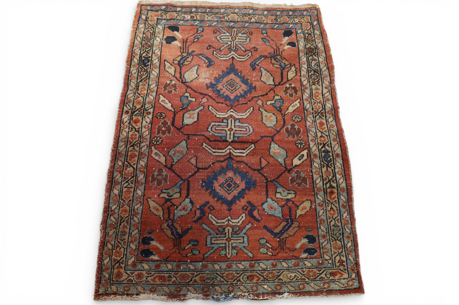 APPROX 3' 10" x 2' 7" HANDMADE WOOL RUG: EDGE WEAR, SOME AREAS OF LOW PILE.