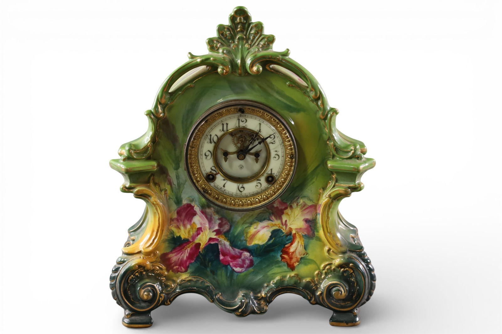 PORCELAIN MANTLE CLOCK: HAND PAINTED PORCELAIN MANTLE CLOCK, ROYAL BONN CASE, ANSONIA, DAMAGE TO PORCELAIN DIAL. ALL CLOCKS ARE SOLD AS IS WE DO ONOT GUARANTEE WORKING ORDER. 12" W x 15" H.