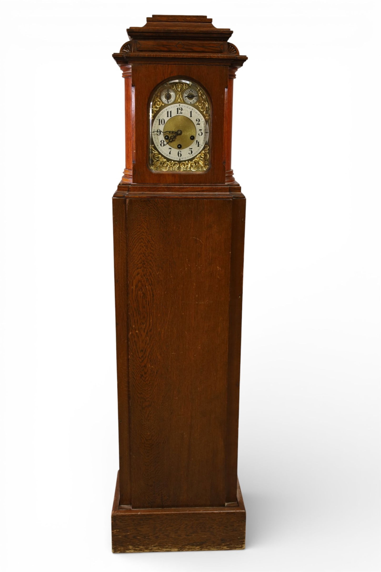GRANDDAUGHTER CLOCK: OAK CASE JUNGHANS GRANDDAUGHTER CLOCK, WEAR TO FINISH, WITH KEY AND PENDULUM. ALL CLOCKS ARE SOLD AS IS WE DO NOT GUARANTEE WORKING ORDER. 14" W x 9" D x 54" H. THIS ITEM EXCEEDS SIZE LIMITATIONS FOR