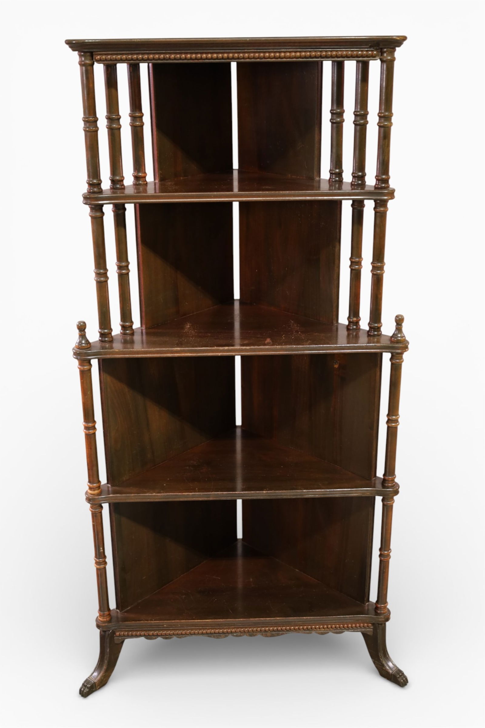 MAHOGANY CORNER WHAT NOT SHELF: 4 TIER MAHOGANY CORNER SHELF, WEAR TO FINISH. 27" W x 11" D x 50" H. THIS ITEM EXCEEDS SIZE LIMITATIONS FOR IN HOUSE SHIPPING, IT MUST BE PICKED UP IN HOUSE OR SHIPPED VIA 3rd PARTY GROUND SHIPPER.