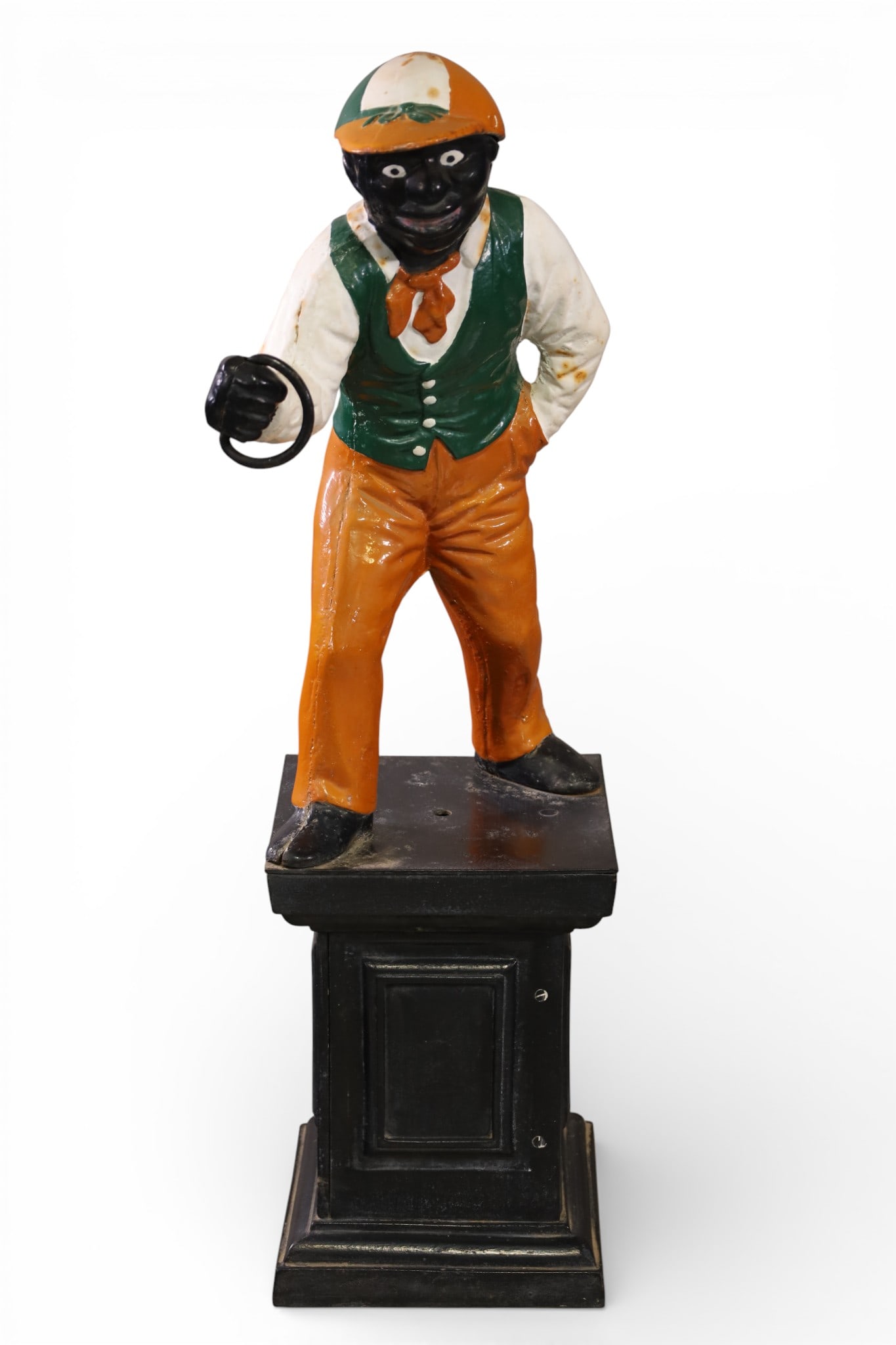 CAST IRON HITCHING POST: BLACK AMERICANA JOCKEY HITCHING POST, SOME PAINT LOSS. 10" W x 38" H. THIS ITEM EXCEEDS SIZE LIMITATIONS FOR IN HOUSE SHIPPING, IT MUST BE PICKED UP IN HOUSE OR SHIPPED VIA 3rd PARTY GROUND SHIPPER.