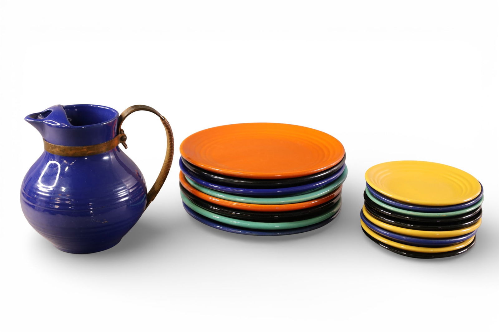 COLLECTION OF BAUER: 8 DINNER PLATES, & 9 SMALL PLATES, & PITCHER. 6, 9 1/2" DIAM PLATES & 7" H. PITCHER.