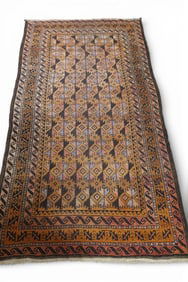 APPROX 6' 8" x 3' 6" HANDMADE WOOL RUG