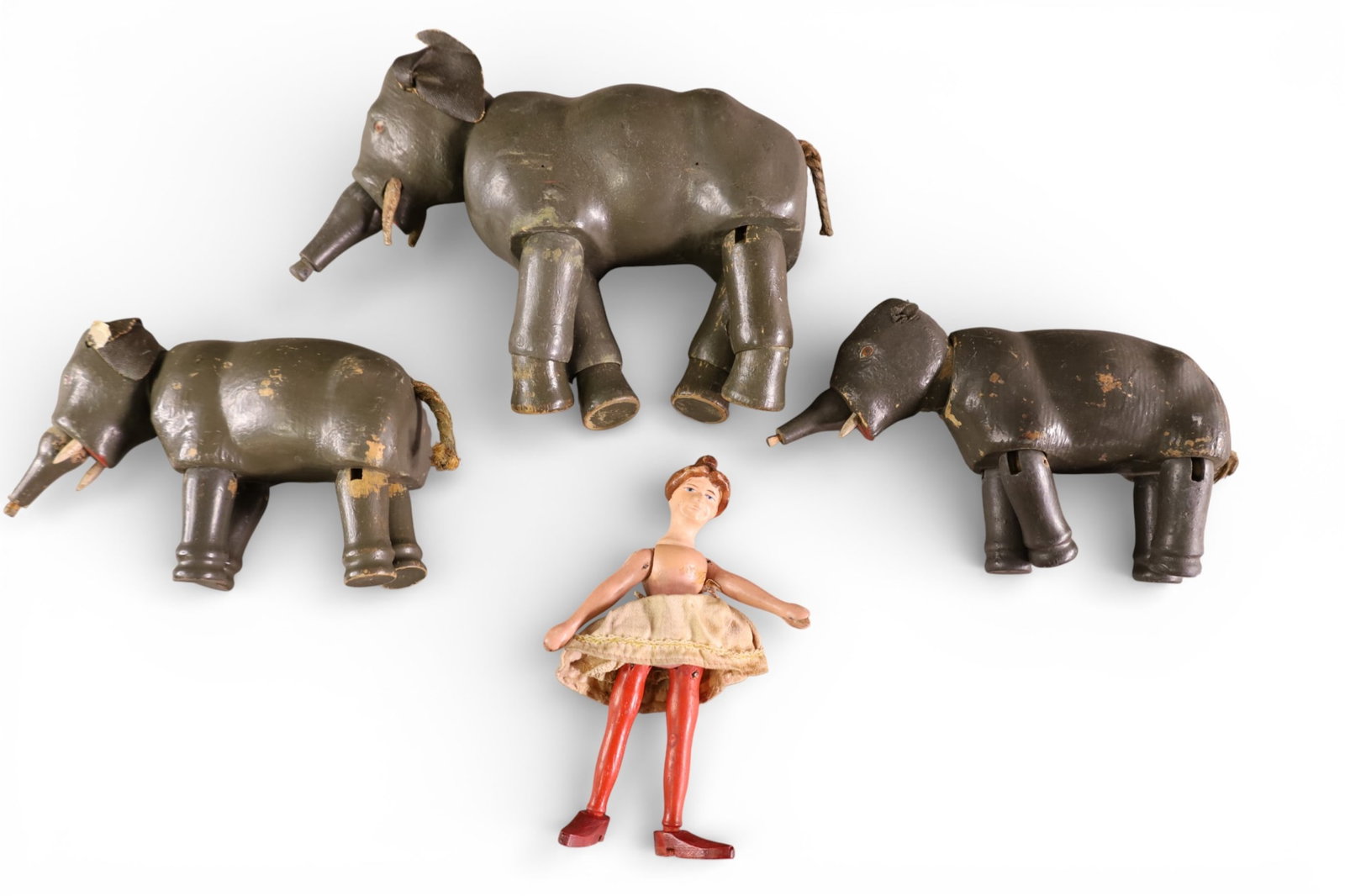 4 PCS OF SCHOENHUT: 3 ELEPHANTS, ACROBAT DOLL. PLAYED WITH CONDITON.