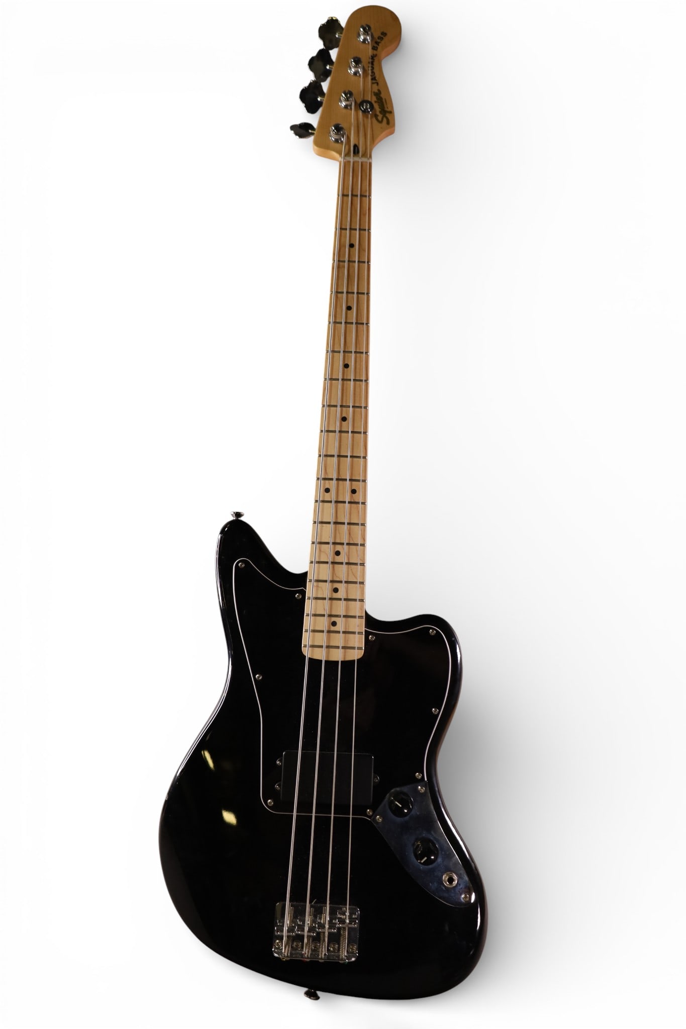 SQUIER JAGUAR BASS GUITAR: SQUIER JAGUAR BASSS GUITAR, NO CASE. THIS ITEM EXCEEDS SIZE LIMITATIONS FOR IN HOUSE SHIPPING, MUST BE PICKED UP IN HOUSE OR SHIPPED VIA 3rd PARTY GROUND SHIPPER.