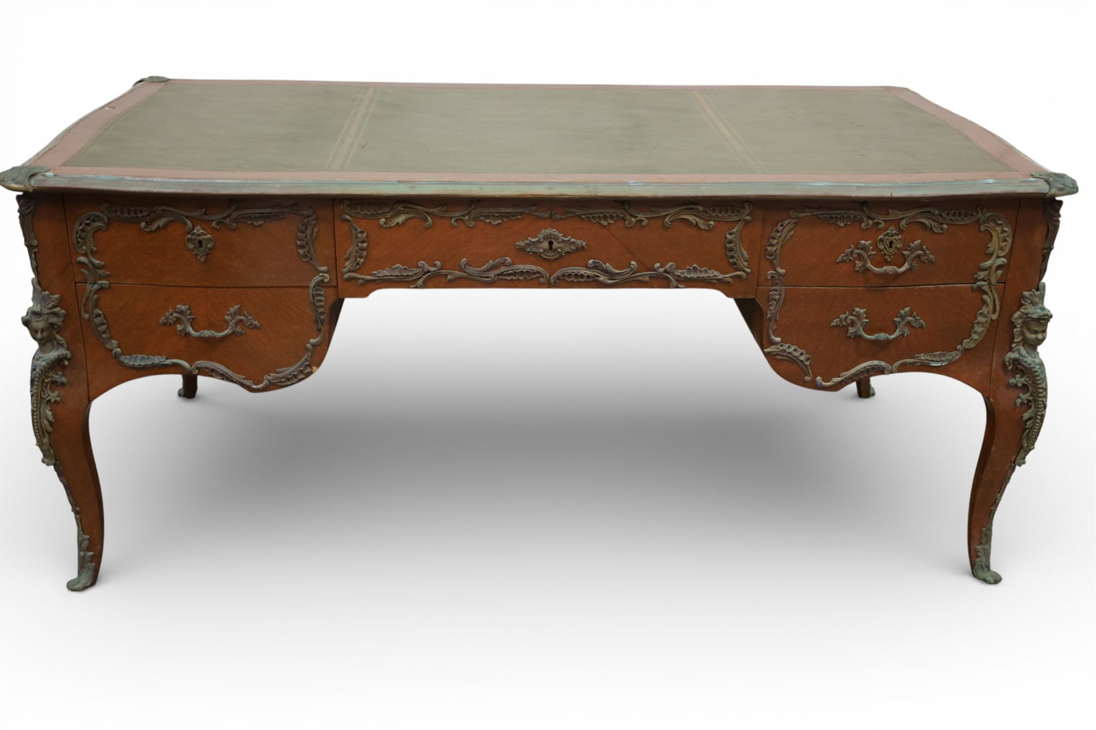 FRENCH BUREAU PLAT DESK: LARGE FRENCH BUREAU PLAT DESK, MOUNTED ORMOLU, WITH LEATHER TOP. 5 DRAWERS. WEAR TO FINISH, OXIDATION TO METAL. 69" W x 35" D x 30" H. THIS ITEM EXCEEDS SIZE LIMITATIONS FOR IN HOUSE SHIPPING,