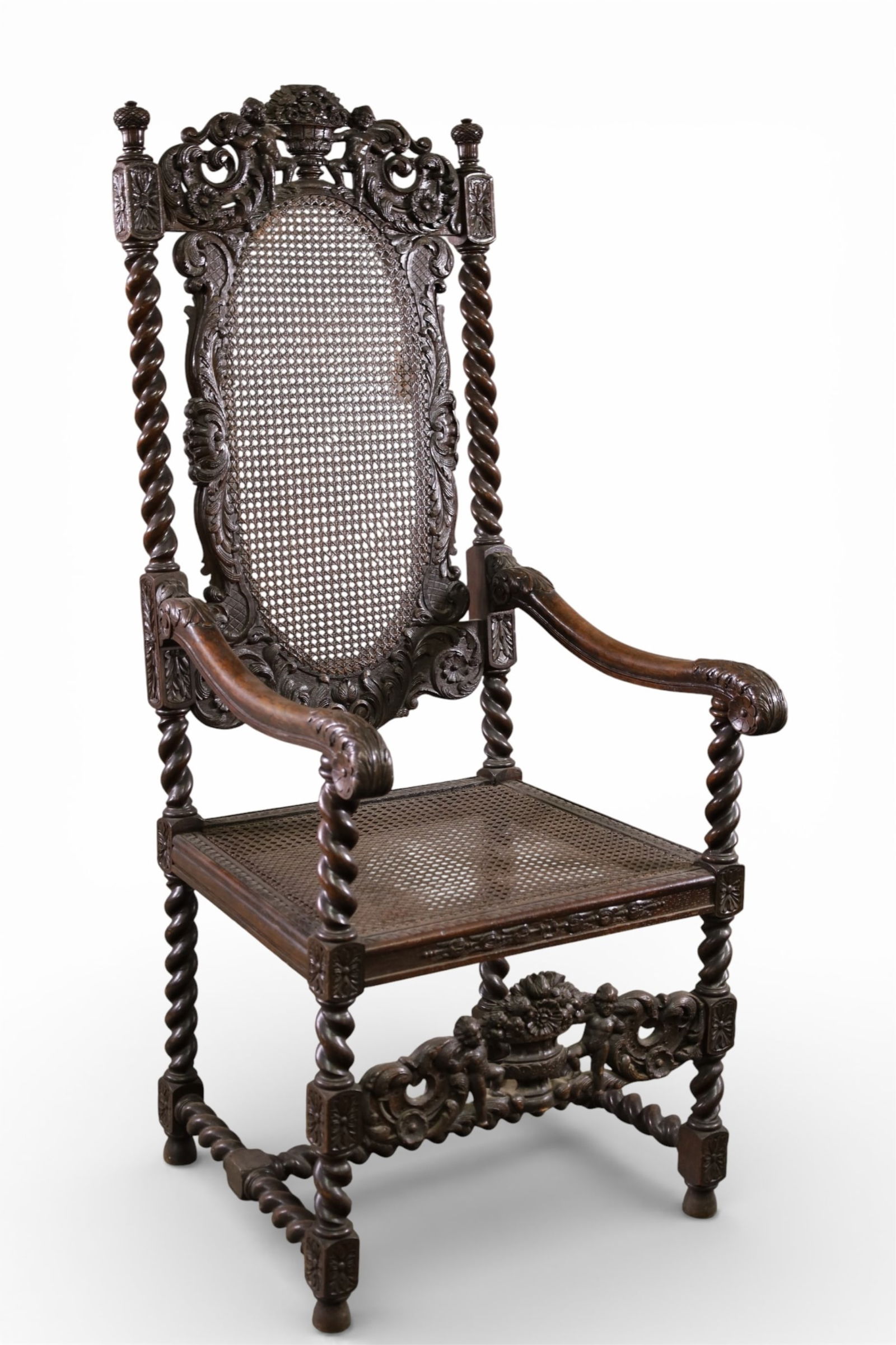 ANTIQUE TALL BACK HALL CHAIR: CANE BACK AND SEAT, CARVED CHERUB DECORATION. TALL BACK HALL CHAIR HOLE TO CANE. 24" W x 24" D x 56" H. THIS ITEM EXCEEDS SIZE LIMITATIONS FOR IN HOUSE SHIPPING, MUST BE PICKED UP IN HOUSE OR 