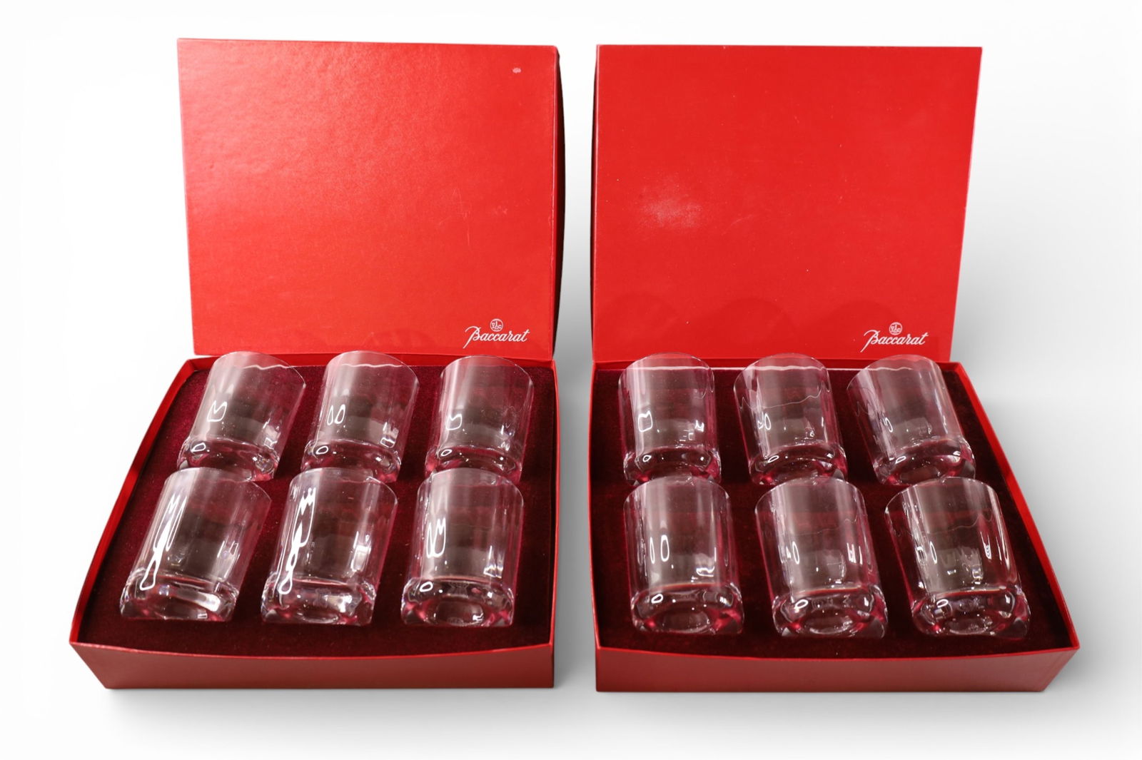 8 PIECE BACCARAT HARMONIE TUMBLER SET: 2 BOX SET, 8 BACCARAT HARMONIE TUMBLERS, IN BOXES. 4" H 7 3 1/2" DIAM.