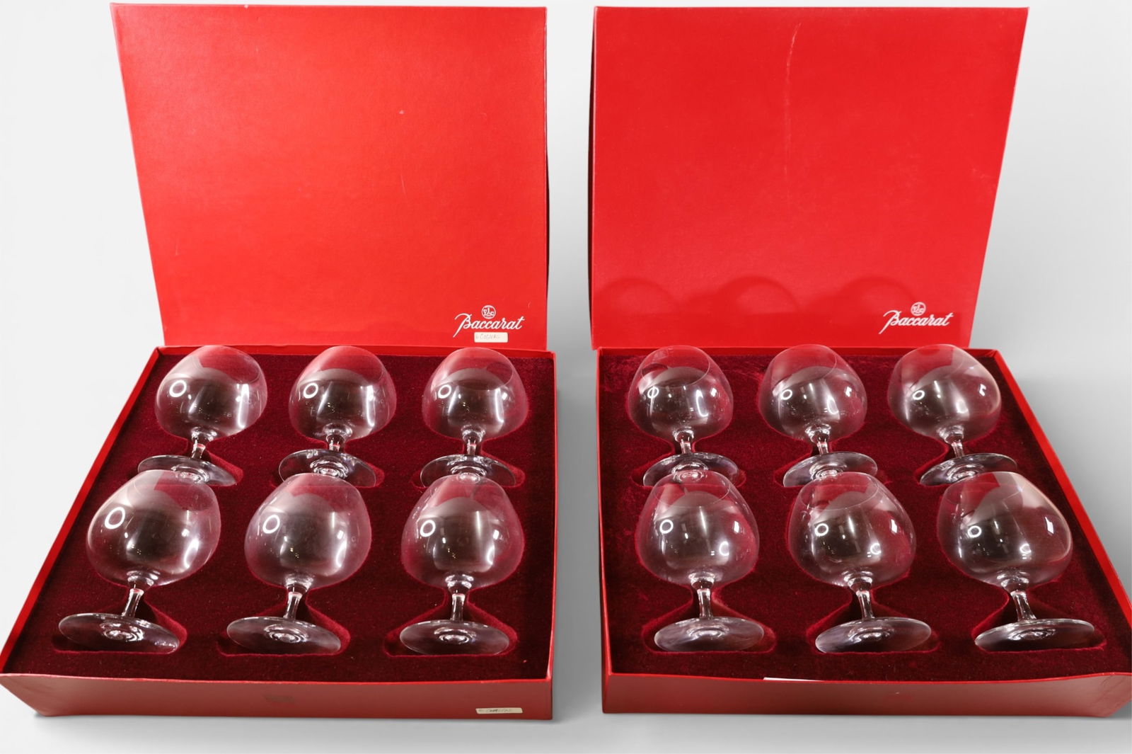 8 PIECE BACCARAT COGNAC GLASSES: 2 BOX SET, 8 BACCARAT COGNAC OR BRANDY SNIFTERS GLASSES. IN BOXES. 4 3/4" H.