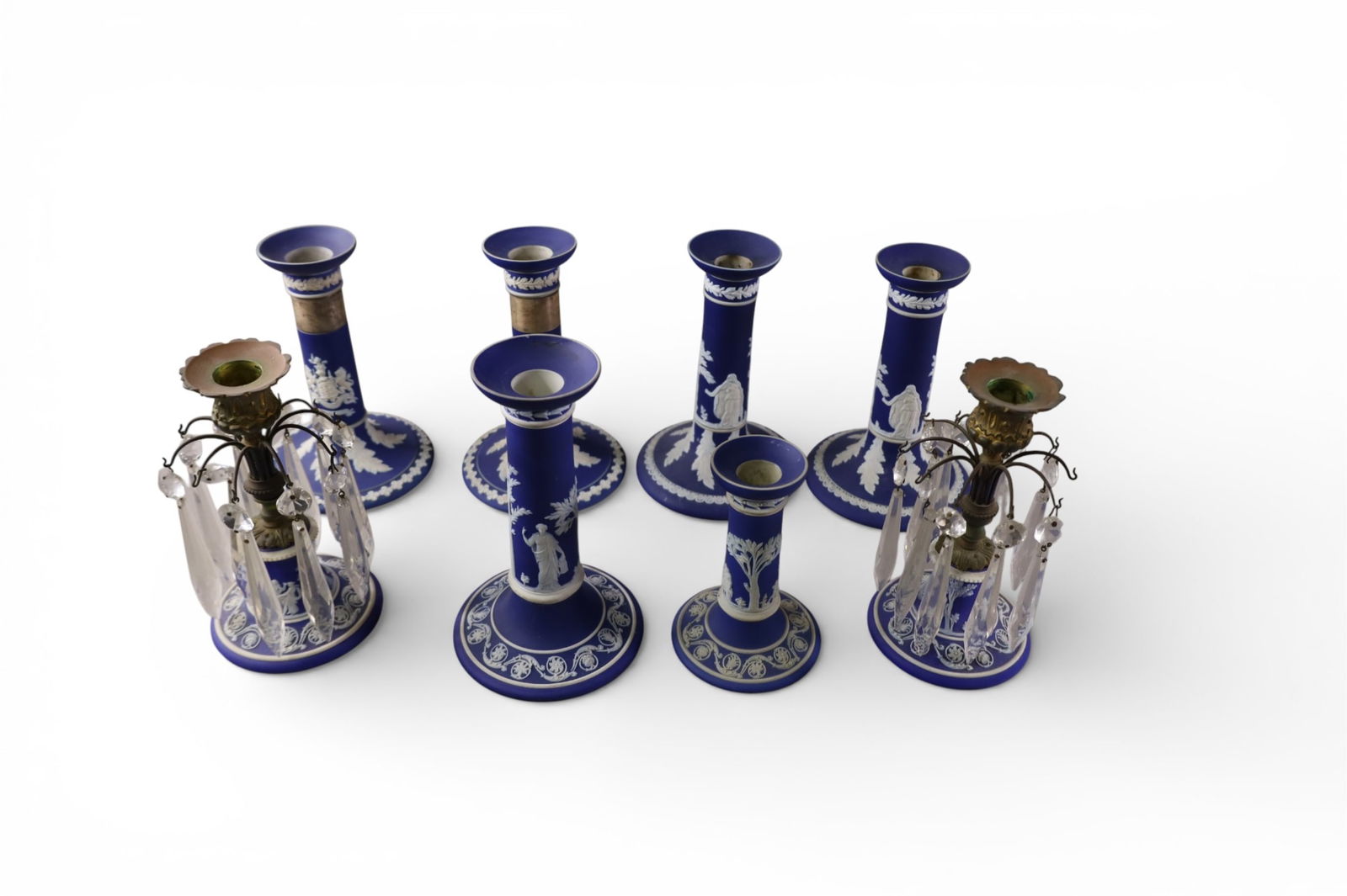 8 WEDGWOOD CANDLESTICKS: 3 PAIRS & 2 SINGLE CANDLESTICKS, WEDGWOOD BLUE JASPERWARE. 7" H.