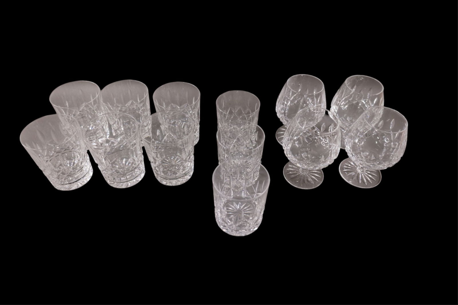 COLLECTION OF WATERFORD CRYSTAL: MISC WATERFORD CRYSTAL GLASSES, ROCKS GLASSES, & SNIFTERS. 5 1/2" H & 4 1/2" H & 4" H.