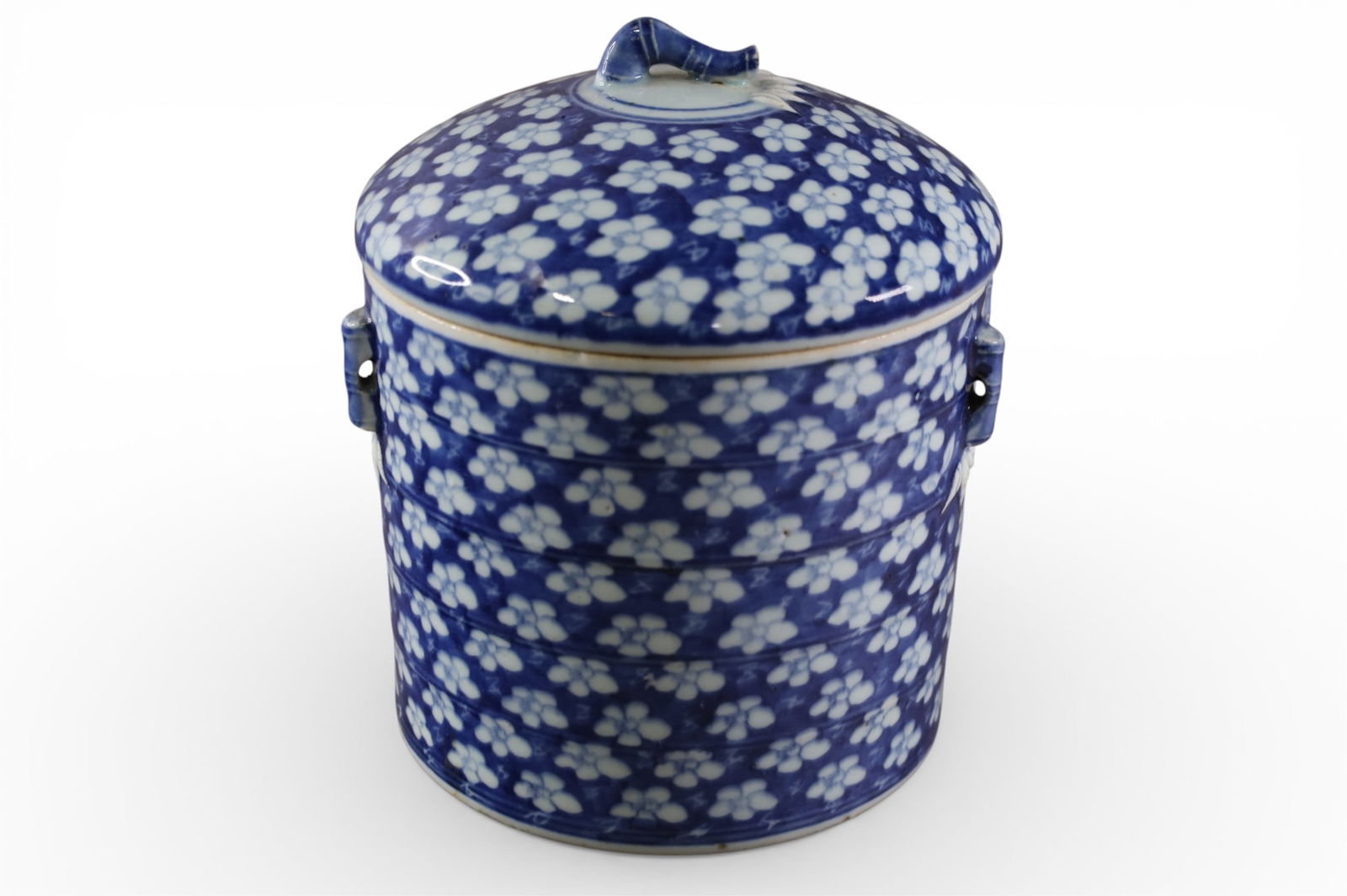CHINESE COVERED JAR: CHINESE BLUE AND WHITE PORCELAIN COVERED JAR, FLORAL PAINTED COVERED JAR, 7" DIAM x9" H.