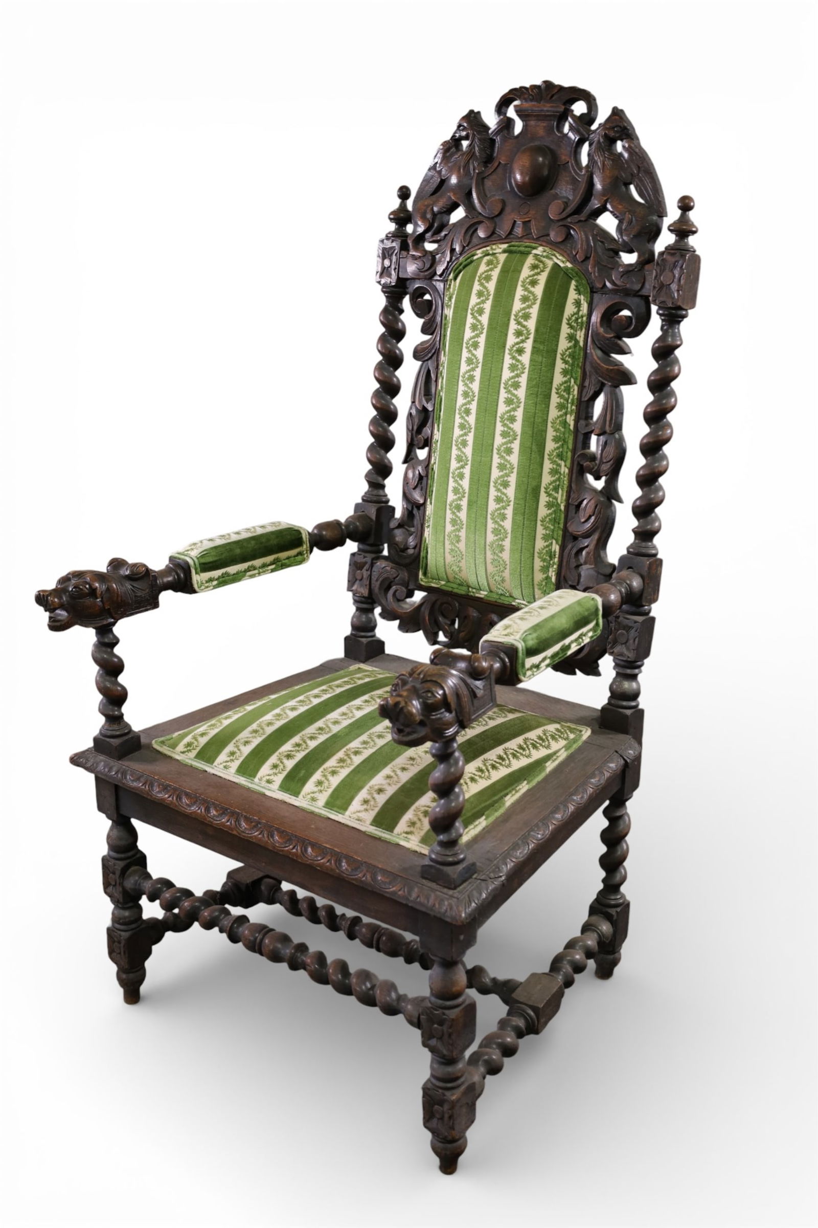 1900'S HIGHLY CARVED HALL CHAIR: HIGHLY CARVED TALL BACK HALL CHAIR, WINGED GRIFFIN UPPER, FIGURAL ARMS. 26" W x 22" D x 52" H. THIS ITEM EXCEEDS SIZE LIMITATIONS FOR IN HOUSE SHIPPING, MUST BE PICKED UP IN HOUSE OR SHIPPED VIA