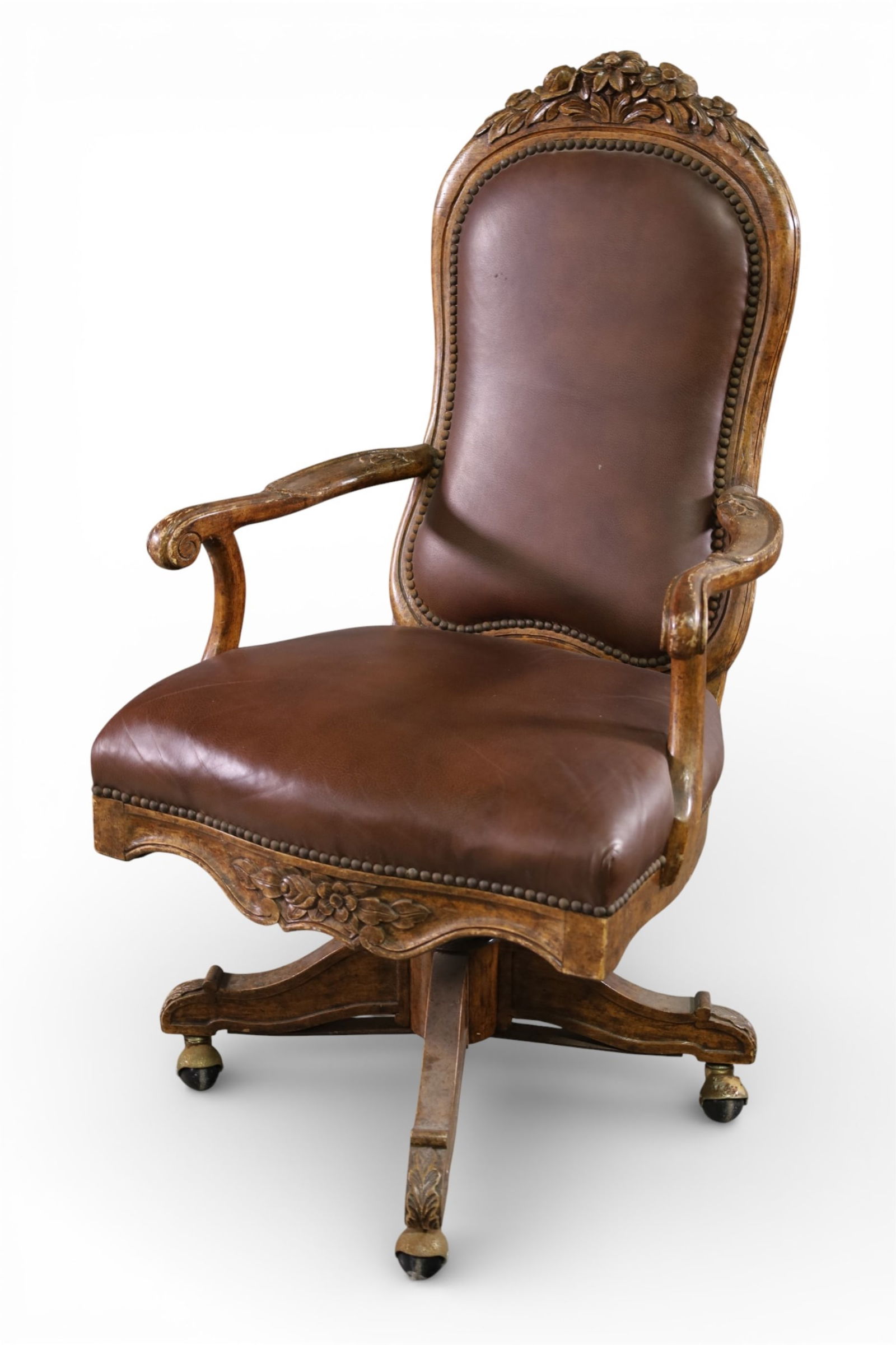 EXECUTIVE CHAIR: VICTORIAN STYLE, CONTEMPORARY, EXECUTIVE CHAIR, LEATHER UPHOSLTERY, BRASS TACKED. WEAR TO FINISH. 23" W x 20" D x 44" H. THIS ITEM EXCEEDS SIZE LIMITATIONS FOR IN HOUSE SHIPPING, MUST BE PICKED 