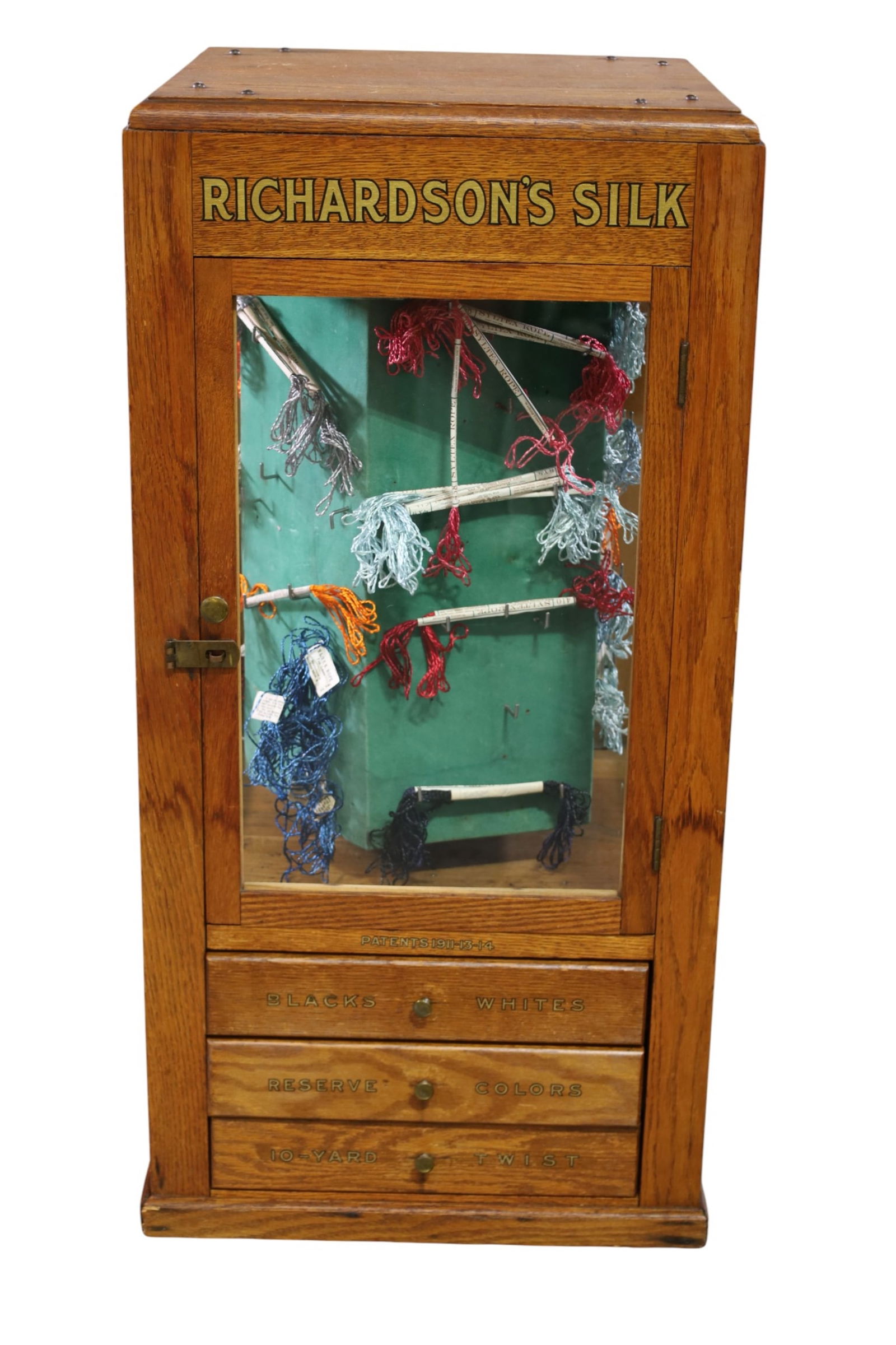 RICHARDSONS SPOOL CABINET: GENERAL STORE RICHARDSONS, SPOOL CABINET, WITH CONTENTS. 16" x 16" x 33" H. THIS ITEM EXCEEDS SIZE LIMITATIONS FOR IN HOUSE SHIPPING, MUST BE PICKED UP IN HOUSE OR SHIPPED VIA 3rd PARTY GROUND 